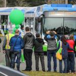 A bus makes its inaugural start of the Swift Green Line route on March 24, 2019, at McCollum Pioneer Park near Everett. State Democrats transportation package proposal includes $10 million to expand the Green bus rapid transit service. (Kevin Clark / Herald file)