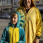 Kannon S., 6, left, and Sheila S., right, pose for a photo during the Downtown Trick or Treat event in Monroe, Washington on Tuesday, Oct. 31, 2023. Children, teens and families walked Main Street to collect candy from local businesses. Dogs sported costumes as well and decorations adorned buildings. (Annie Barker / The Herald)