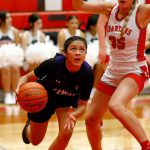 Kamiak senior Vivian Mawudeku gets by a defender on the baseline against Stanwood on Thursday, Nov. 30, 2023, at Stanwood High School in Stanwood, Washington. (Ryan Berry / The Herald)