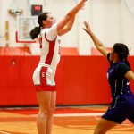 Stanwoods Jazmyn Legg takes a deep shot against Kamiak on Thursday, Nov. 30, 2023, at Stanwood High School in Stanwood, Washington. (Ryan Berry / The Herald)