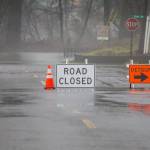 Road closures and detour signs direct people away from flooded roads on Tuesday, Dec. 5, 2023 in Sultan, Washington. (Olivia Vanni / The Herald)