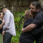 Left to right, Tasha Zebrowan, Pip Zebrowan, Lilliana Blackstar and Josh Carpenter embrace their partners after the maypole ritual during Beltane in May 2023, at the Aquarian Tabernacle Church in Index, Washington. Beltane celebrates the height of spring. (Annie Barker / The Herald)