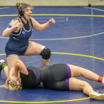 Arlingtons Katie Wheeler reacts to beating Lake Stevens Anna Cappel on Wednesday, Dec. 13, 2023 in Everett, Washington. (Olivia Vanni / The Herald)
