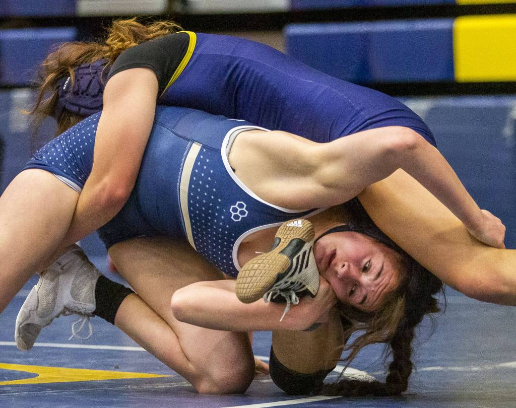 Arlingtons Danielle Crew wrestles uring a wrestling scramble at Everett High School on Wednesday, Dec. 13, 2023 in Everett, Washington. (Olivia Vanni / The Herald)