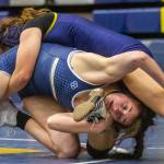 Arlingtons Danielle Crew wrestles uring a wrestling scramble at Everett High School on Wednesday, Dec. 13, 2023 in Everett, Washington. (Olivia Vanni / The Herald)