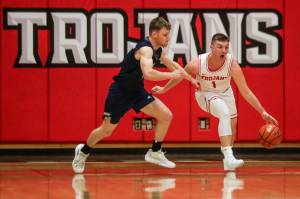 Everett Community College’s Ethan Martin (1) moves with the ball during a game against Tacoma at Everett Community College in Everett, Washington on Saturday, Dec. 9, 2023. (Annie Barker / The Herald)