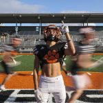 Sophomore wide receiver and free safety Gino Howard poses for a portrait between drills at Granite Falls High School on Wednesday, Oct. 11, 2023. (Annie Barker / The Herald)
