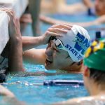 Woodinville senior Levi Major shouts about missing a time by 0.01 seconds after finishing the 100-yard freestyle consolation race at the 4A WIAA Boys High School Swim and Dive Championships on Friday, Feb. 18, 2023, at the Weyerhaeuser King County Aquatic Center in Federal Way, Washington. (Ryan Berry / The Herald)