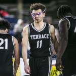 Mountlake Terraces Chris Meegans sportsmanship medal hangs over his face as his team packs up after losing to ODea in the 3A quarterfinal game on Thursday, March 2, 2023, in Tacoma, Washington. (Olivia Vanni / The Herald)