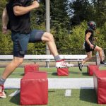 Archbishop Murphy football players run through warmups during practice on Aug. 24, 2023, in Everett, Washington. The new-look Wildcats were looking to embrace a youth movement under new head coach Joe Cronin after a winless season last fall. (Olivia Vanni / The Herald)