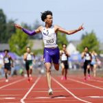 Ryan Berry / The Herald
Lake Stevens senior Grant Buckmiller throws his hands up as he wins the 4A boys 400-meter dash by more than three seconds at the WIAA State Track and Field Championships on May 27 in Tacoma.
