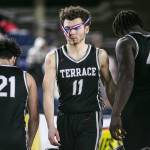 Mountlake’s Chris Meegan’s sportsmanship medal hangs over his face as his team packs up after losing to O’Dea in the 3A quarterfinal game on Thursday, March 2, 2023 in Tacoma, Washington. (Olivia Vanni / The Herald)