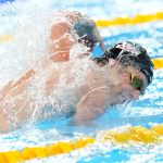 Matt King of Team United States swims in the Men's 4x100m Medley Relay final at the World Aquatics Championships in Doha, Qatar, Sunday, Feb. 18, 2024. (AP Photo/Hassan Ammar)
