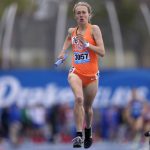 Oklahoma State's Taylor Roe anchors her team to victory in the women's distance medley relay at the Drake Relays athletics meet, Saturday, April 30, 2022, in Des Moines, Iowa. (AP Photo/Charlie Neibergall)