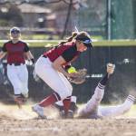 Snohomishs Camryn Sage fumbles the ball while Glacier Peaks Alexis Garcia slides into second during the game on Friday, March 15, 2024 in Snohomish, Washington. (Olivia Vanni / The Herald)