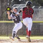 Glacier Peaks Emma Hirshorn catches a throw to get Snohomishs Shelby Gilbert out at first during the game on Friday, March 15, 2024 in Snohomish, Washington. (Olivia Vanni / The Herald)