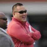 Washington State athletic director Pat Chun watches players on the first day of football practiceAug. 6, 2021, in Pullman. Chung is leaving Washington State for the same job at rival Washington. (AP Photo/Ted S. Warren)