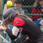 Snohomishs Abby Edwards gets hit in the head with a pitch during the 3A state softball semifinal game against Garfield on Saturday, May 25, 2024 in Lacey, Washington. (Olivia Vanni / The Herald)