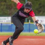 Snohomishs Hannah Siegler reaches out to field a ball during the 3A state softball semifinal game against Garfield on Saturday, May 25, 2024 in Lacey, Washington. (Olivia Vanni / The Herald)