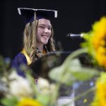 Alyssa Acosta smiles during her valedictorian speech during Arlington High Schools graduation at Angel of the Winds Arena on Thursday, June 13, 2024, in Everett, Washington. (Olivia Vanni / The Herald)