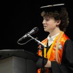 Mason Edwards, chosen by the faculty to speak, delivers an address during Monroe High Schools 2024 commencement on Wednesday, June 12, 2024, at Angel of the Winds Arena in Everett, Washington. (Ryan Berry / The Herald)