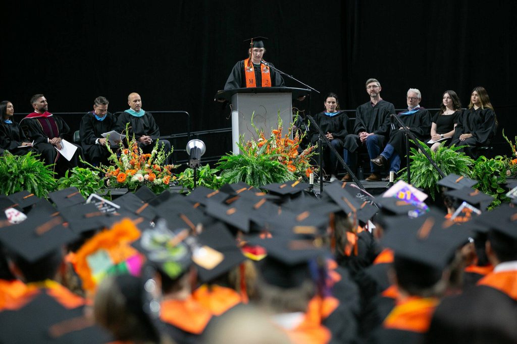 Tyler Blackburn, chosen by his class to speak, delivers an address during Monroe High Schools 2024 commencement on Wednesday, June 12, 2024, at Angel of the Winds Arena in Everett, Washington. (Ryan Berry / The Herald)