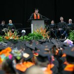 Tyler Blackburn, chosen by his class to speak, delivers an address during Monroe High Schools 2024 commencement on Wednesday, June 12, 2024, at Angel of the Winds Arena in Everett, Washington. (Ryan Berry / The Herald)