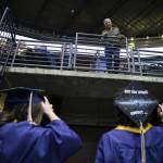 Graduates talk with family members before the start of Arlington High School graduation at Angel of the Winds Arena on Thursday, June 13, 2024, in Everett, Washington. (Olivia Vanni / The Herald)
