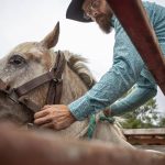 Ryan Anderson prepares to ride during the Timberbowl Rodeo in Darrington, Washington, on Saturday, June 29, 2024. (Annie Barker / The Herald)