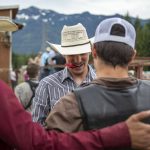 Cowboys congratulate each other during the Timberbowl Rodeo in Darrington, Washington, on Saturday, June 29, 2024. (Annie Barker / The Herald)