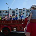 An old fire engine goes by during Everetts Fourth of July Parade on Thursday, July 4, 2024, in downtown Everett, Washington. (Ryan Berry / The Herald)