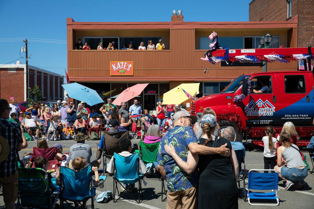 People line Colby during Everetts Fourth of July Parade on Thursday, July 4, 2024, in downtown Everett, Washington. (Ryan Berry / The Herald)