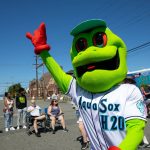 AquaSox mascot Webbly waves to the crowd during Everetts Fourth of July Parade on Thursday, July 4, 2024, in downtown Everett, Washington. (Ryan Berry / The Herald)