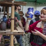 Attendees wander booths during the Washington Midsummer Renaissance Faire at Sky Meadows Park in Snohomish, Washington on Sunday, Aug. 6, 2023. (Annie Barker / The Herald)