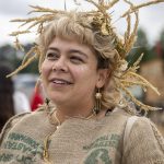Maddie Bailey, 29, of Whidbey Island, poses for a photo while dressed as a harvest fairy during the Washington Midsummer Renaissance Faire at Sky Meadows Park in Snohomish, Washington on Sunday, Aug. 06, 2023. (Annie Barker / The Herald)