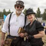 Mount Vernon residents Miles Baron, 64, left, and Lisa Case, 57, right, pose for a photo during the Washington Midsummer Renaissance Faire at Sky Meadows Park in Snohomish, Washington on Sunday, Aug. 6, 2023. (Annie Barker / The Herald)