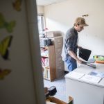 Jack White sets up his desk at Hazelwood Elementary oon Aug. 26 in Lynnwood. (Olivia Vanni / The Herald)