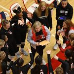 Everett Community College volleyball coach Whitney Williams talks to her team during a break in a match. Williams, who enters her fourth full season, is currently at 55 wins and has 15 matches remaining in the regular season to set a new all-time record. Williams could surpass former coach Robyn Peckol-Filimaua who served between 2012-18 and compiled 56 wins. (Photo courtesy of EvCC Athletic Director Garet Studer)