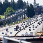 A Link light rail train moves northbound toward the Shoreline South station on Aug. 28 in Shoreline. (Olivia Vanni / The Herald)