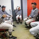 Ross Noe (left to right), Steve Jensen, Tom Freal, Jim Brotten and Dean Corcoran all laugh in the locker room as they get ready to officiate a high school football game on Friday, Oct. 4, 2024 in Snohomish, Washington. (Olivia Vanni / The Herald)