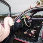 Flamingos fill the inside of Marty Vales art car. (Olivia Vanni / The Herald)