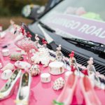 Seashells and flamingos dot the hood of Marty Vales art car. (Olivia Vanni / The Herald)