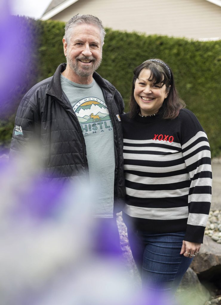 Olivia Vanni / The Herald
Snohomish County Dahlia Society members Doug Symonds and Alysia Obina in Lake Stevens.
