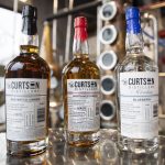 Curtson Distillerys Bad Batch Umber, Northwest Umber and Blueberry Moonshine. (Olivia Vanni / The Herald)