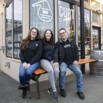 Curtson Distillery owners Robert Thompson, right, Malinda Curtis, center, and employee Sarah Trocano, left, at the distillery in Sultan. (Olivia Vanni / The Herald)
