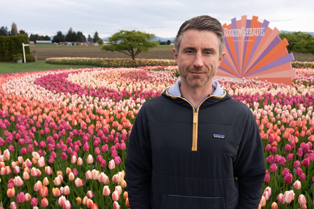 Brent Roozen, a tulip farmer at Roozengaarde outside of Mount Vernon, Washington during the Skagit Valley Tulip Festival on April 10, 2025. (Will Geschke / The Herald)