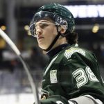 Everett Silvertips forward Shea Busch skates behind the goal during game seven of the second round of the WHL playoffs against the Portland Winterhawks on Tuesday, April 22, 2025 in Everett, Washington. (Olivia Vanni / The Herald)