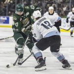 Everett Silvertips defenseman Kaden Hammell fights Portland Winterhawks Cole Slobodian for the puck during game seven of the second round of the WHL playoffs on Tuesday, April 22, 2025 in Everett, Washington. (Olivia Vanni / The Herald)