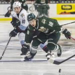 Everett Silvertips forward Zackary Shantz scrambles after the puck during game seven of the second round of the WHL playoffs against the Portland Winterhawks on Tuesday, April 22, 2025 in Everett, Washington. (Olivia Vanni / The Herald)