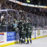 Everett Silvertips players celebrate teammate Landon DuPont scoring during game seven of the second round of the WHL playoffs against the Portland Winterhawks on Tuesday, April 22, 2025 in Everett, Washington. (Olivia Vanni / The Herald)